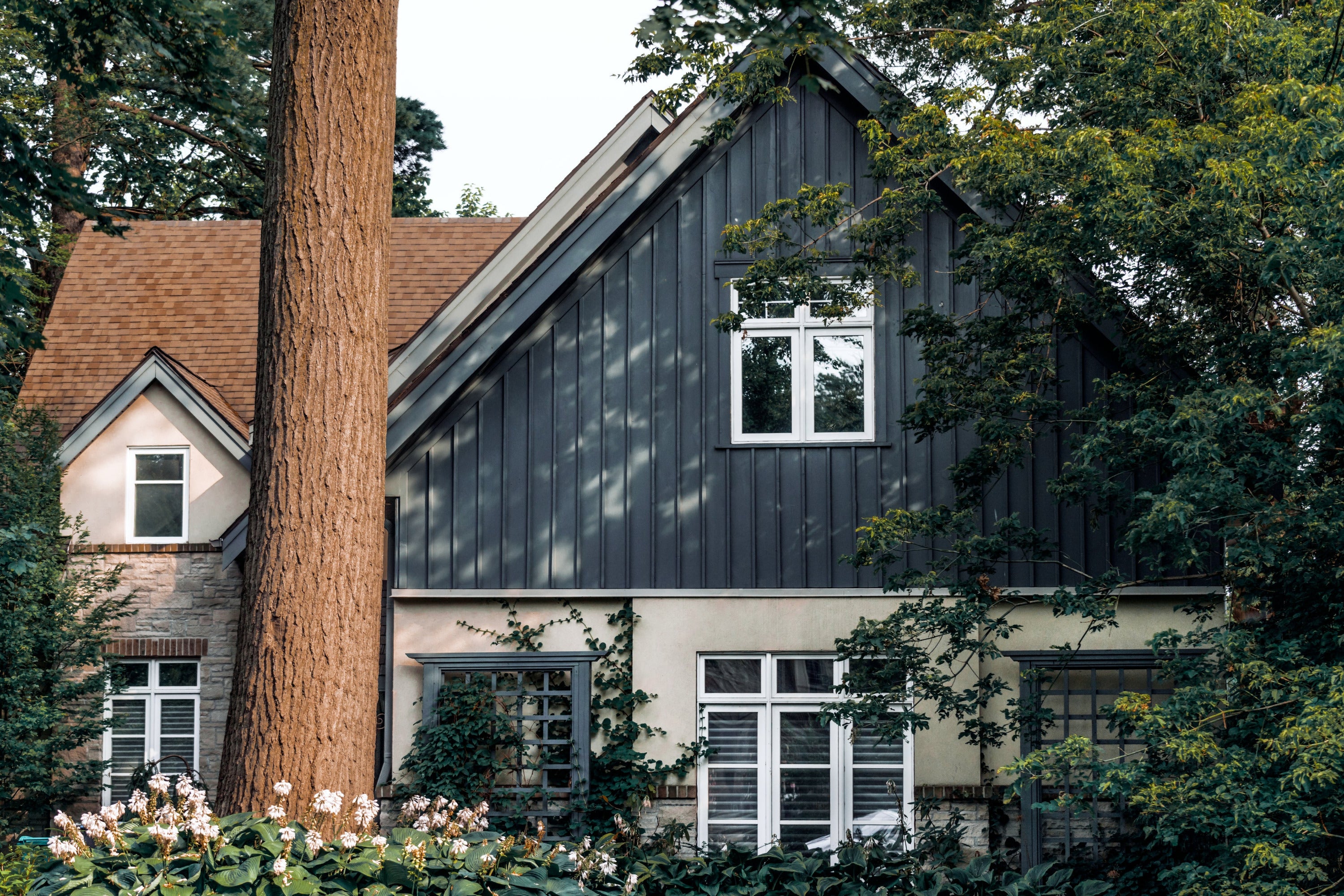 A quaint house in the woods.